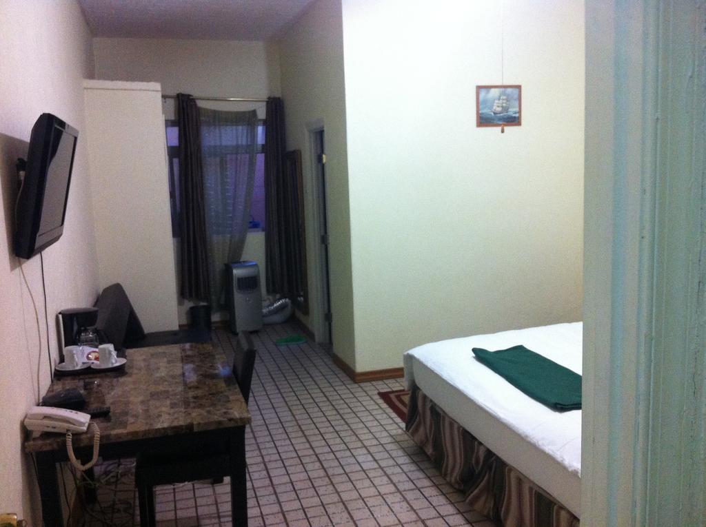 Executive Airport Hotel เอนเทบเบ้ ห้อง รูปภาพ